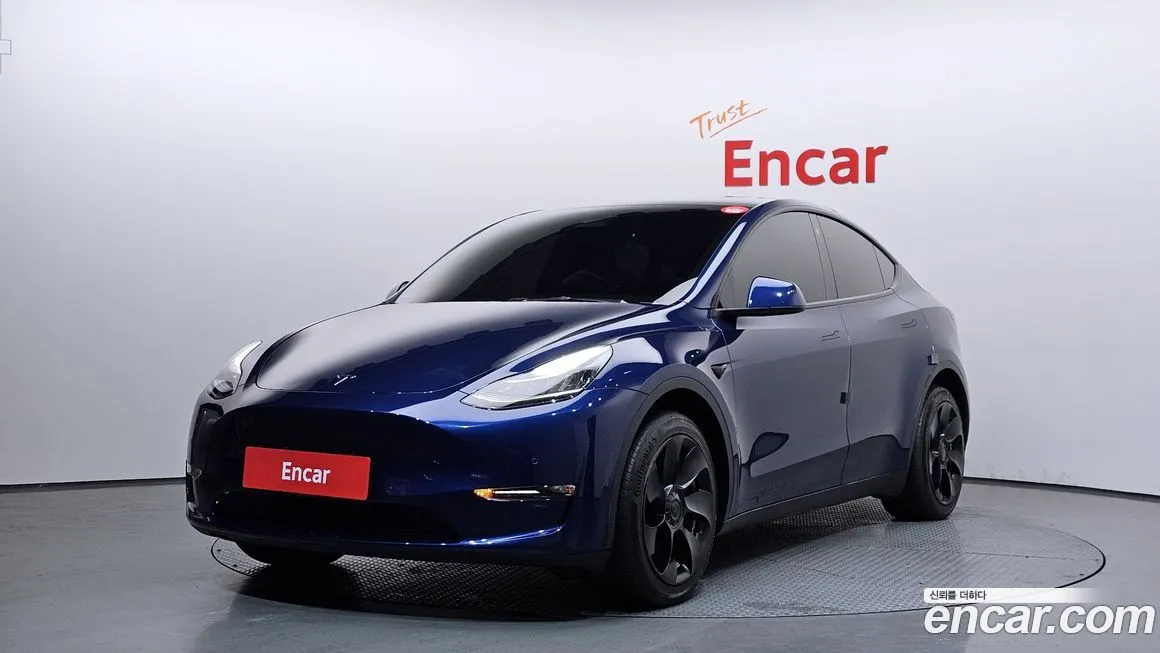Tesla Model Y — фото 1