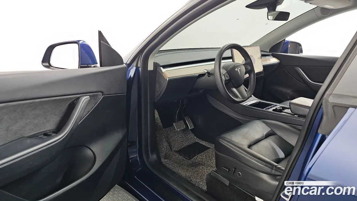Tesla Model Y — фото 7