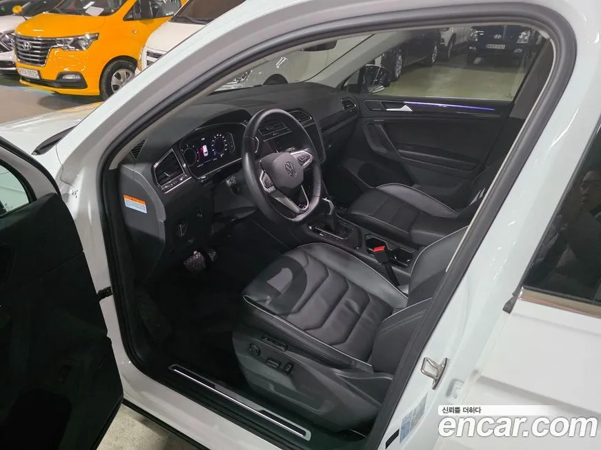 Volkswagen Tiguan — фото 10