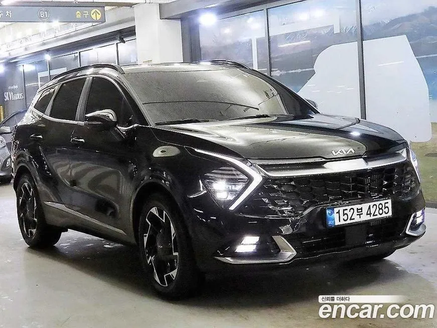 Kia Sportage — фото 1