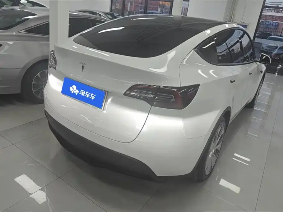 Tesla Model Y — фото 6