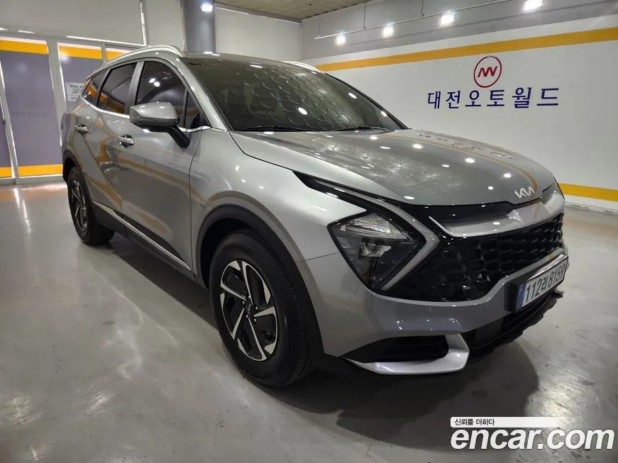 Kia Sportage — фото 1
