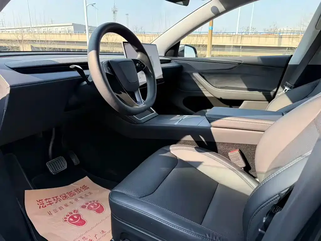 Tesla Model Y — фото 8