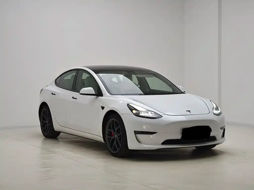 Tesla Model 3 — фото 7