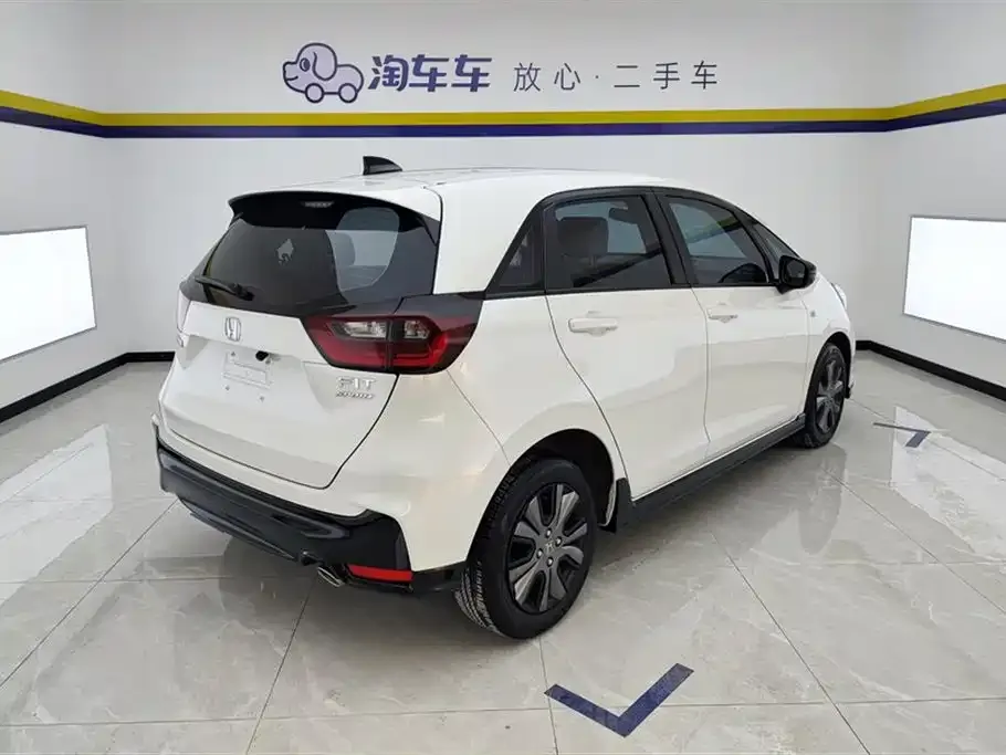 Honda Fit — фото 8