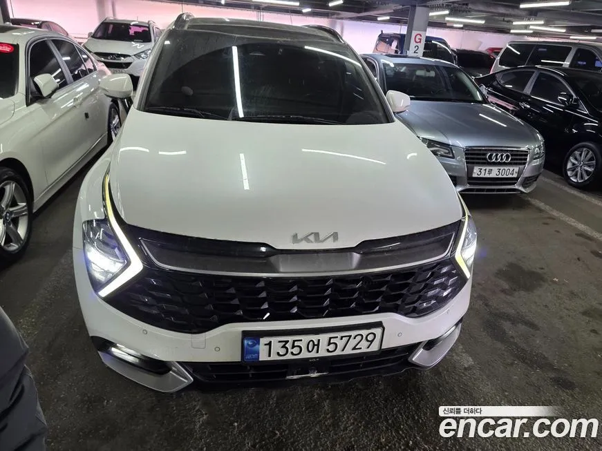 Kia Sportage — фото 1