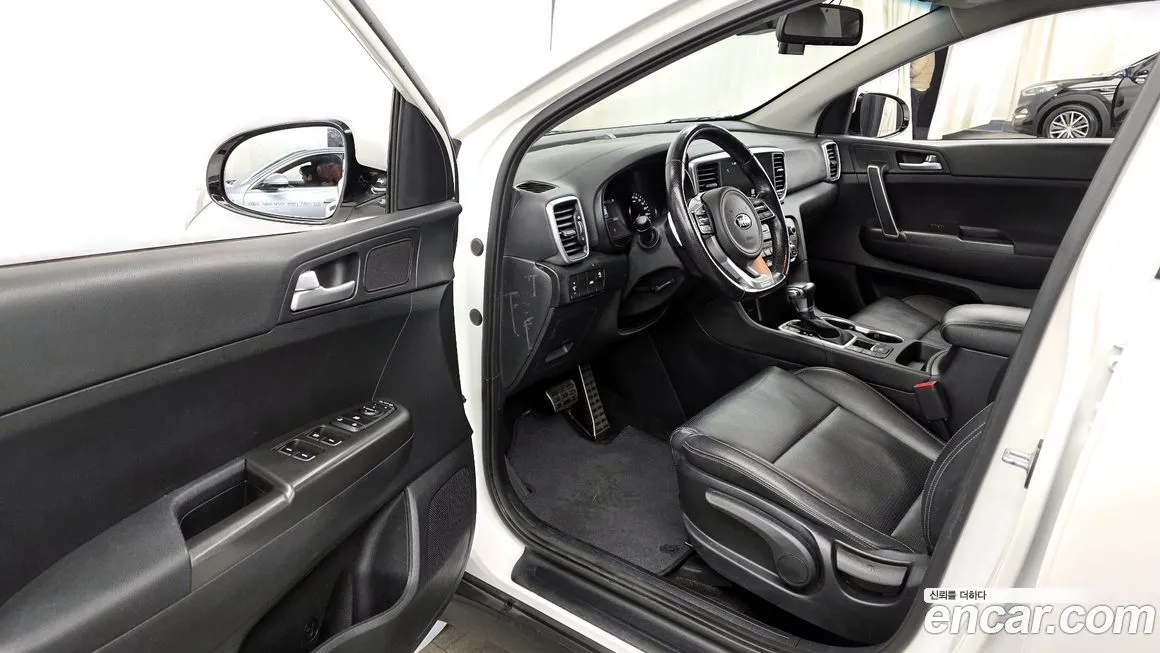 Kia Sportage — фото 10