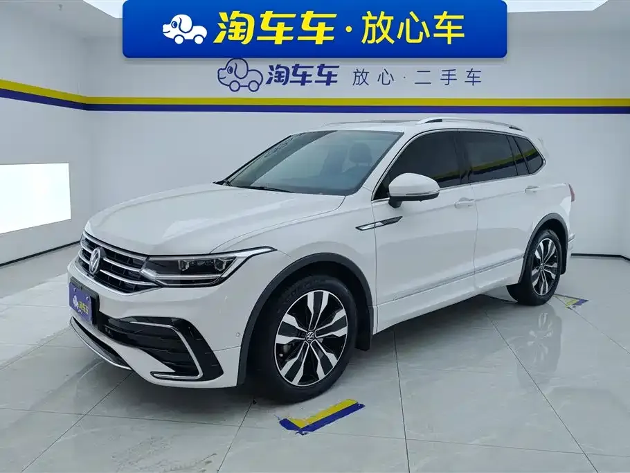 Volkswagen Tiguan L — фото 1