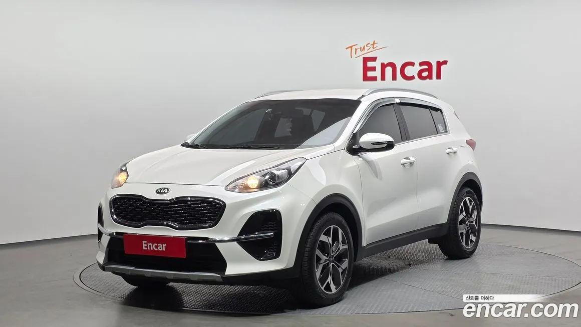 Kia Sportage — фото 1