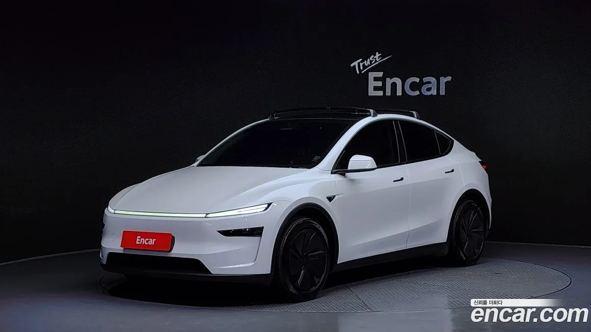 Tesla Model Y — фото 1