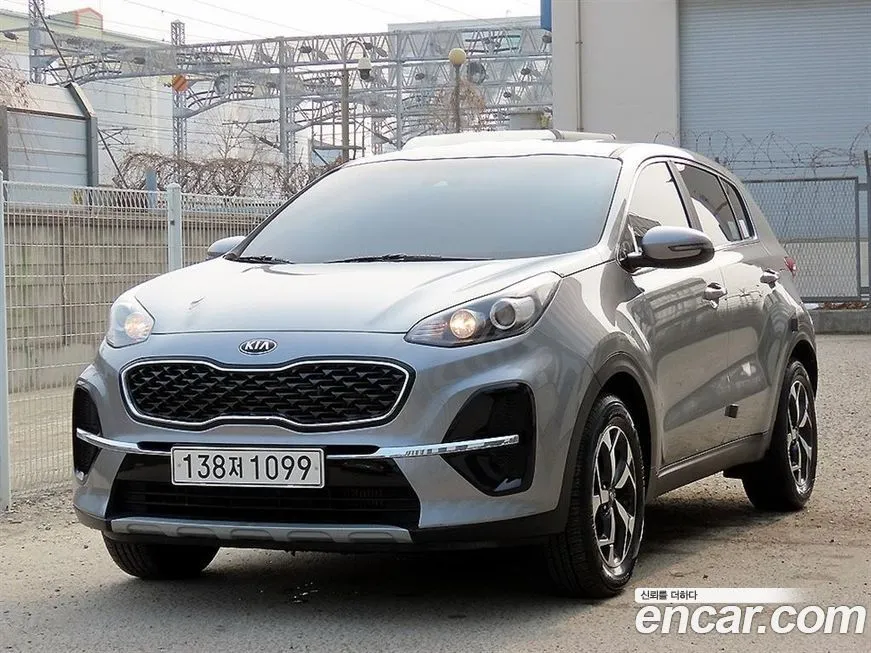Kia Sportage — фото 7