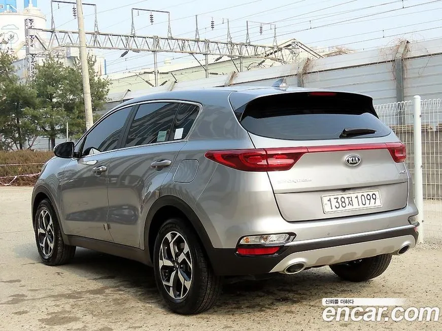 Kia Sportage — фото 10