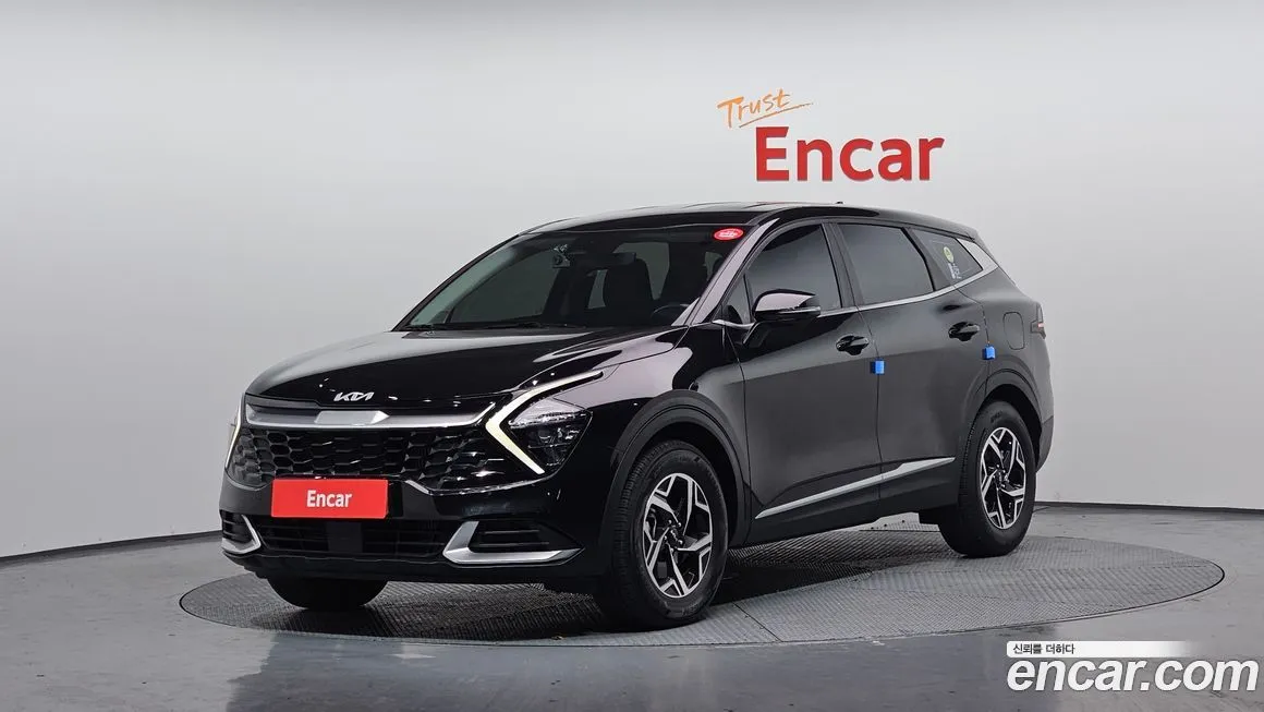 Kia Sportage — фото 1