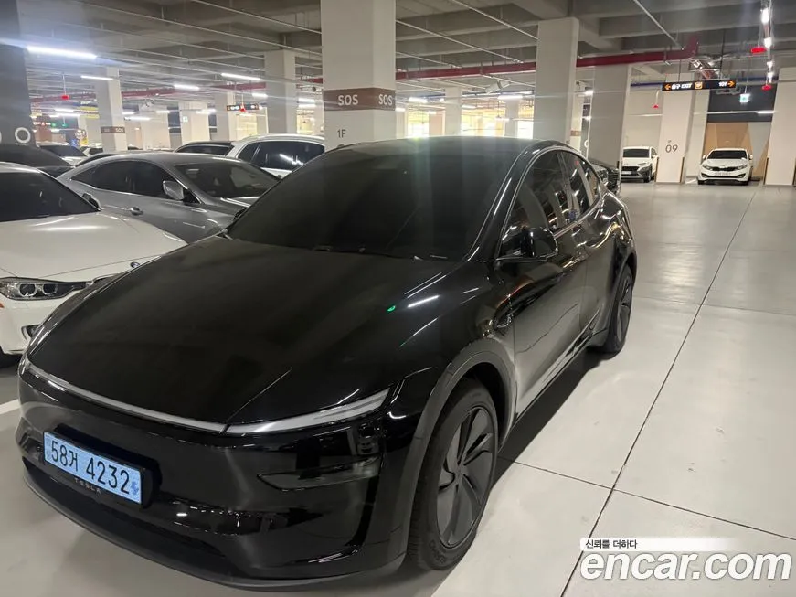 Tesla Model Y — фото 6