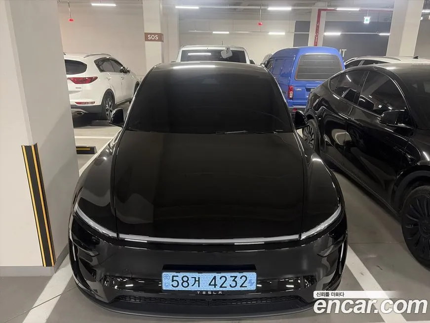 Tesla Model Y — фото 1