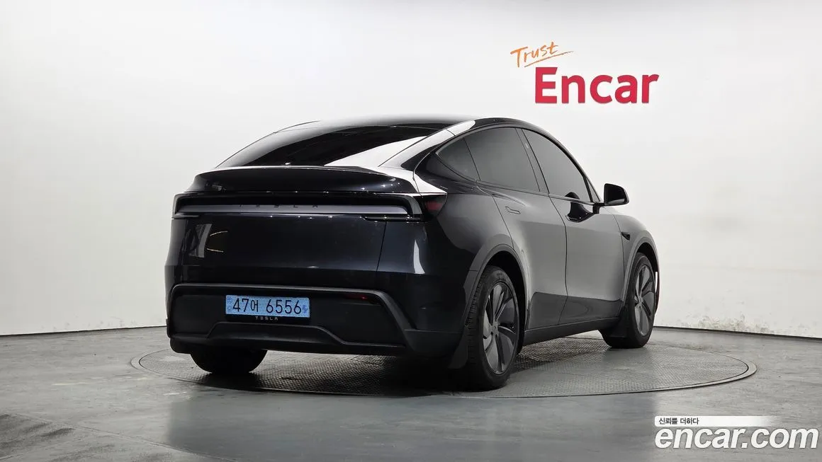 Tesla Model Y — фото 5