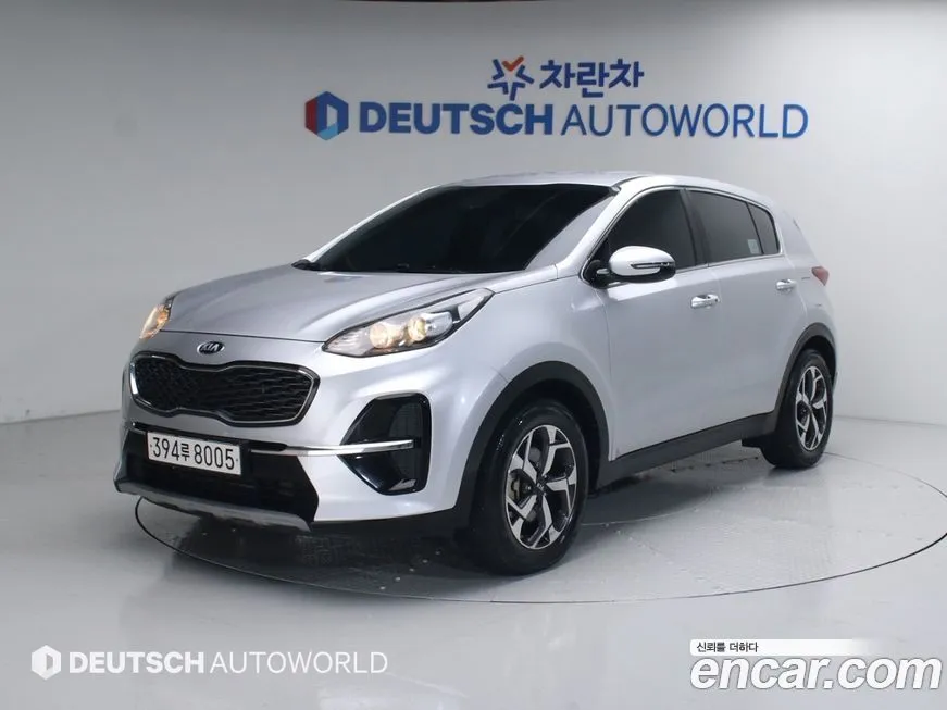 Kia Sportage — фото 1