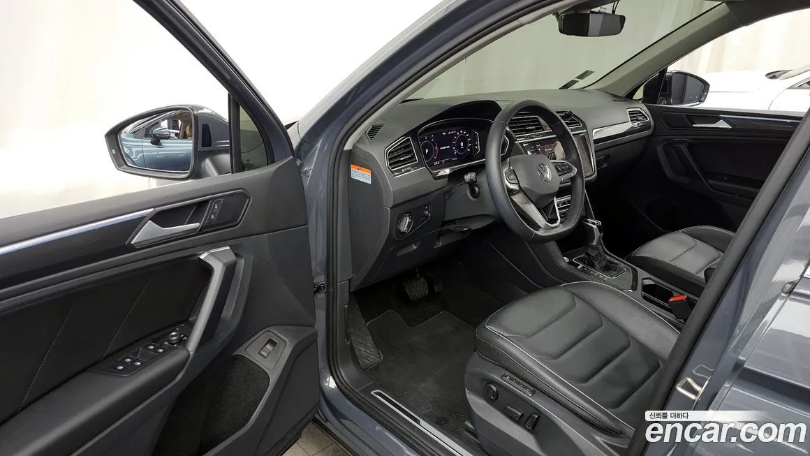 Volkswagen Tiguan — фото 10
