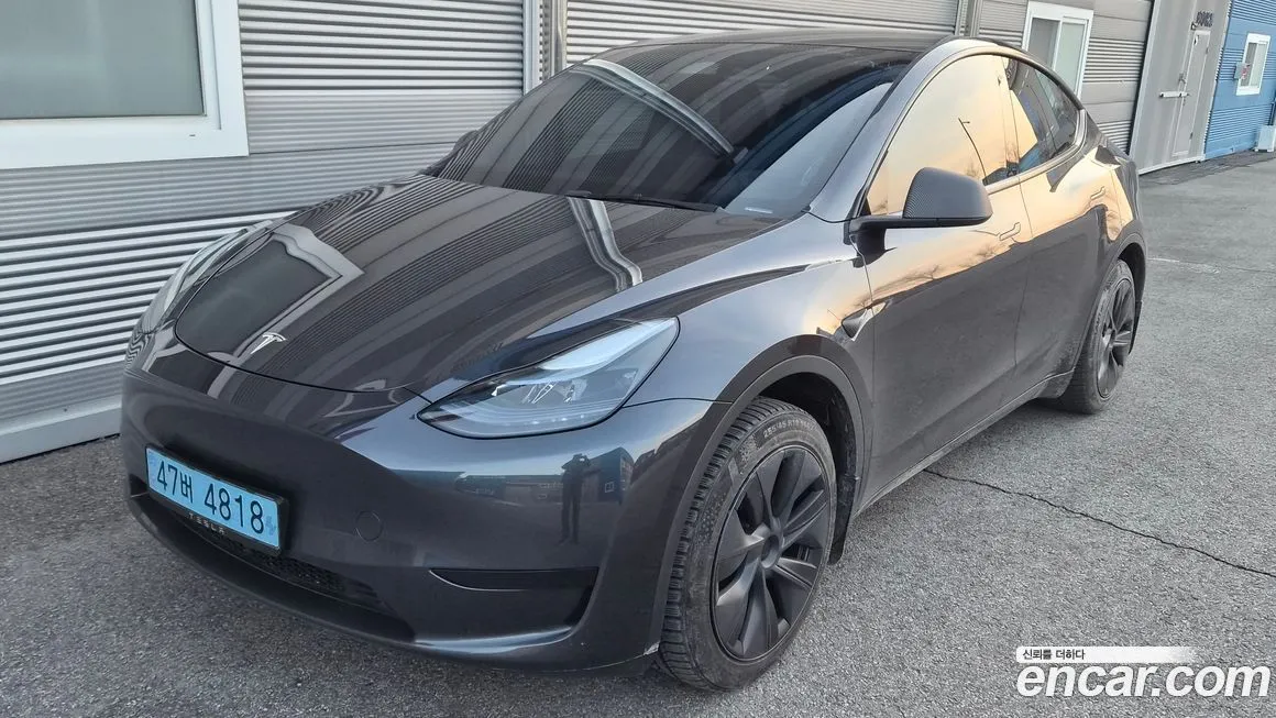 Tesla Model Y — фото 1