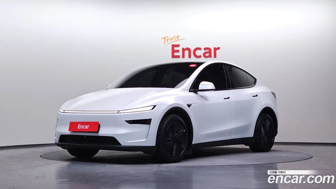 Tesla Model Y — фото 1