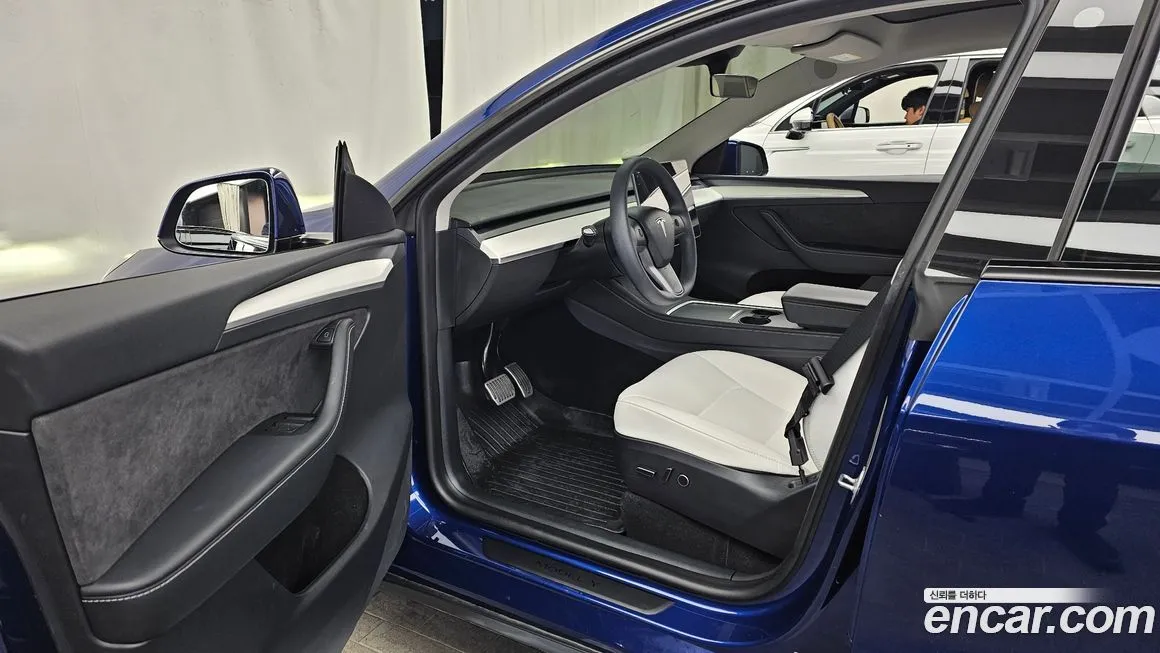 Tesla Model Y — фото 10