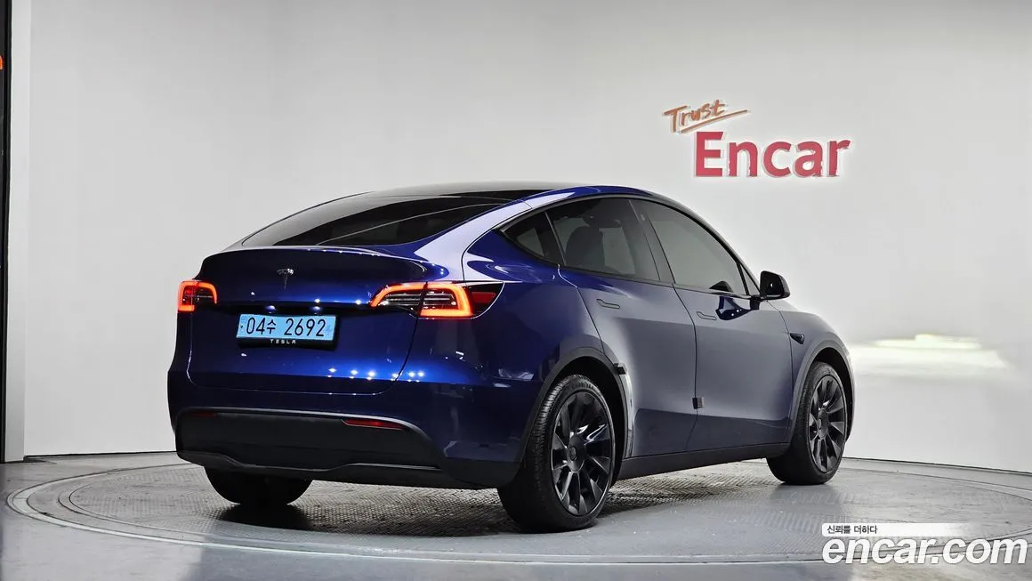 Tesla Model Y — фото 9