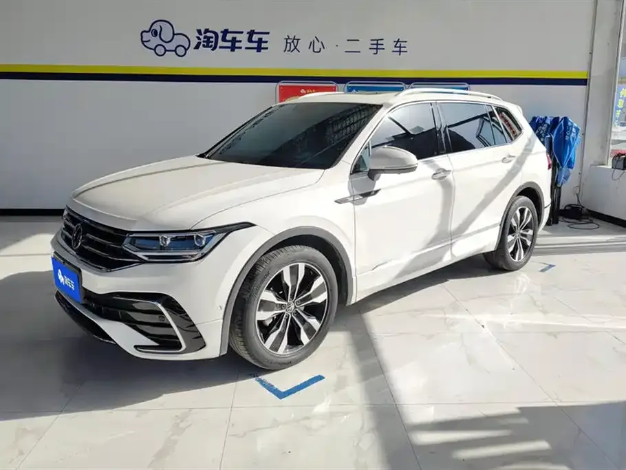 Volkswagen Tiguan L — фото 1