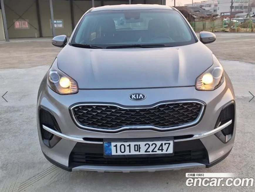 Kia Sportage — фото 1