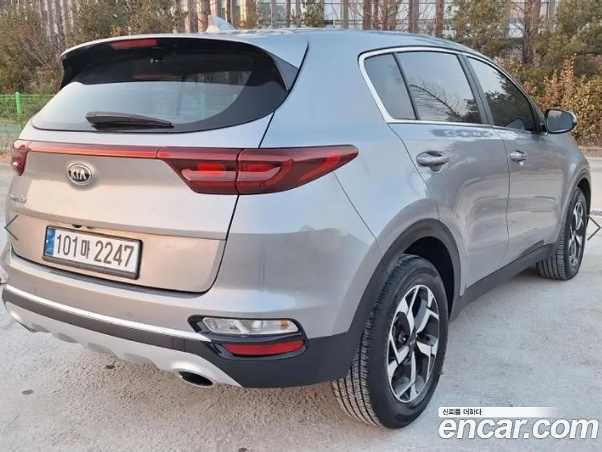 Kia Sportage — фото 5