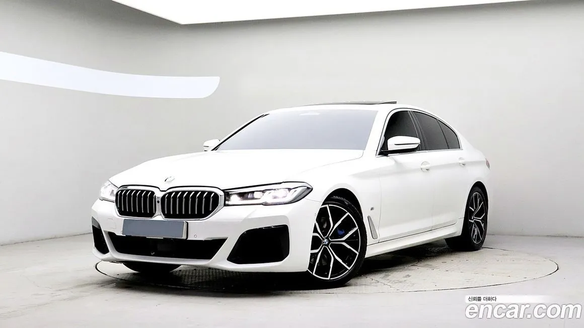 BMW 5-Series — фото 1