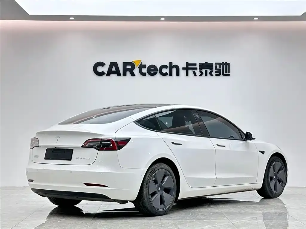 Tesla Model 3 — фото 7