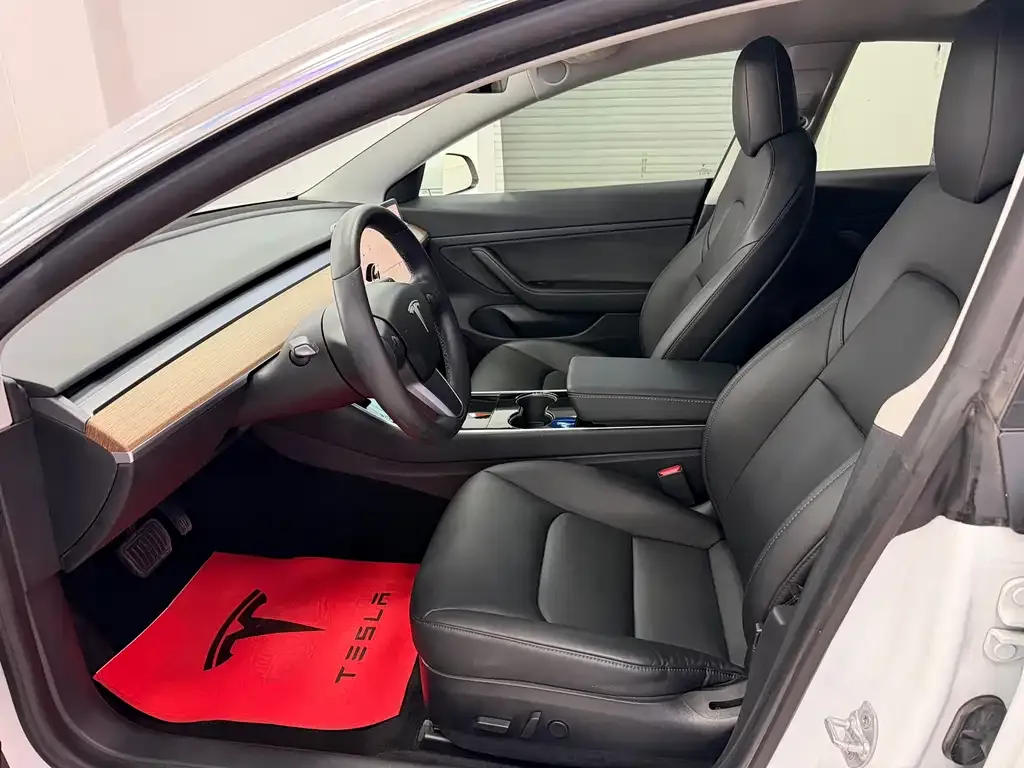 Tesla Model 3 — фото 5