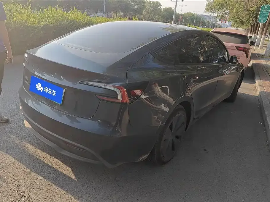 Tesla Model 3 — фото 9