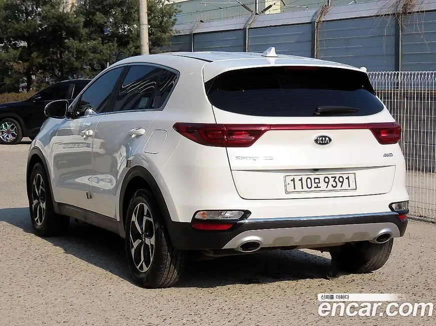 Kia Sportage — фото 10