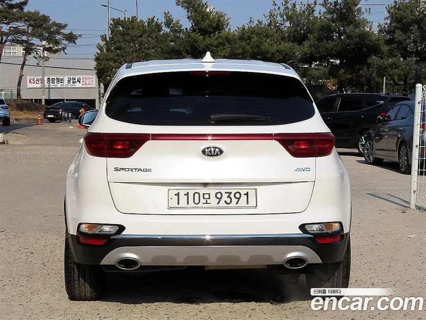 Kia Sportage — фото 7