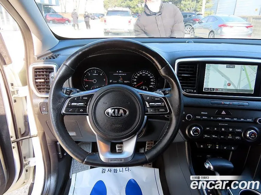 Kia Sportage — фото 9