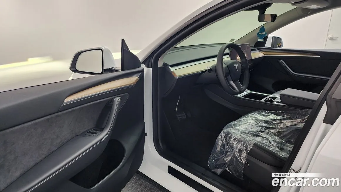 Tesla Model Y 2024 из KR, фото 6