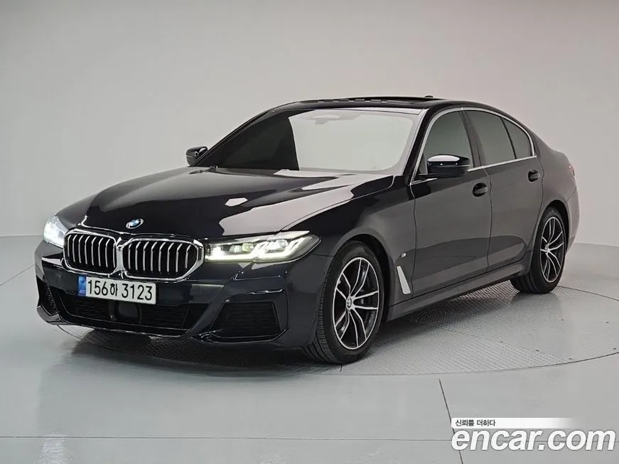 BMW 5-Series — фото 1
