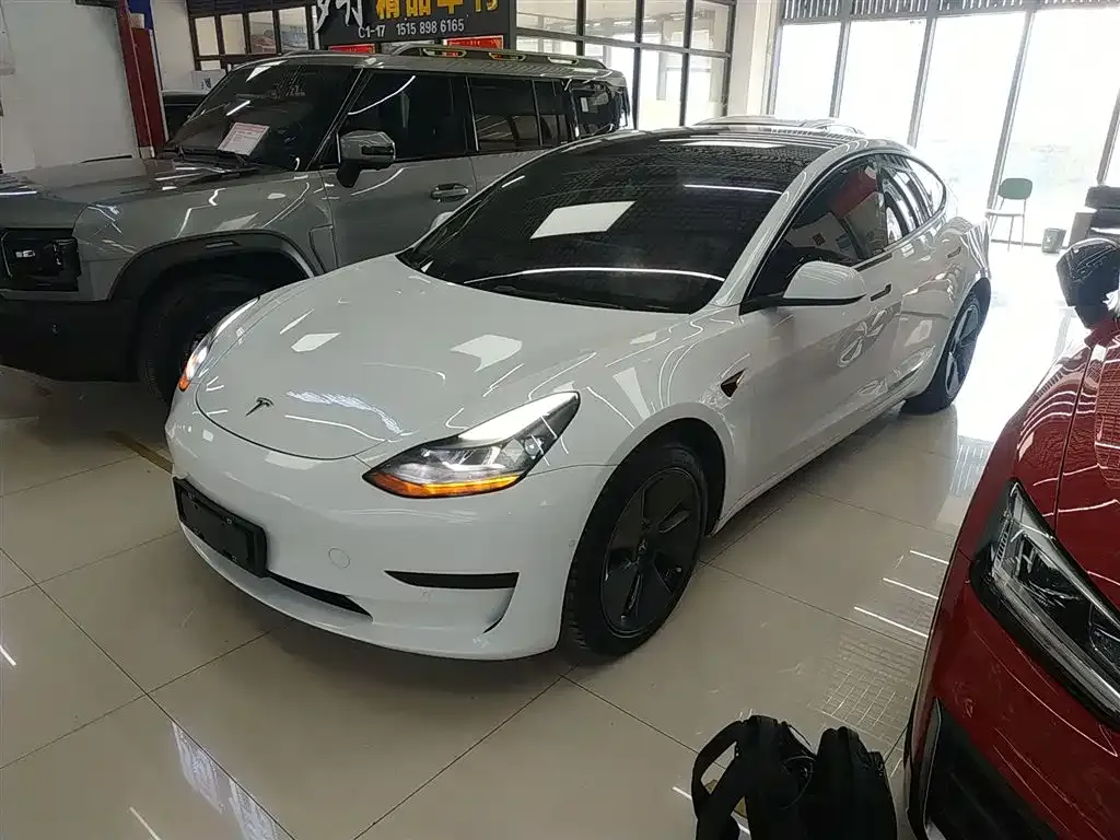 Tesla Model 3 — фото 5
