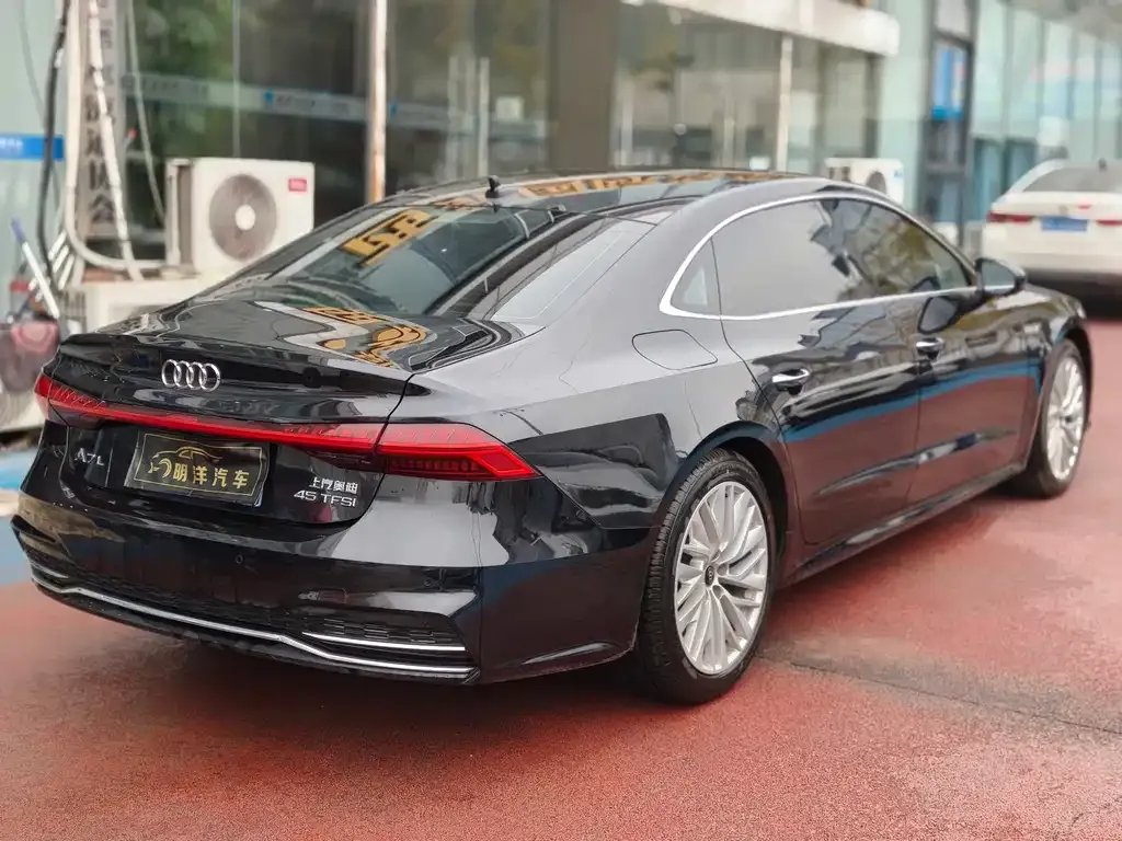 Audi A7L — фото 5