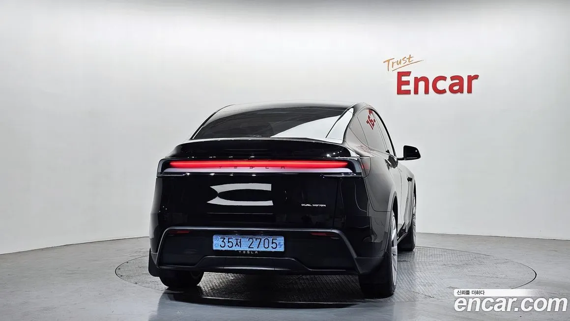Tesla Model Y — фото 6