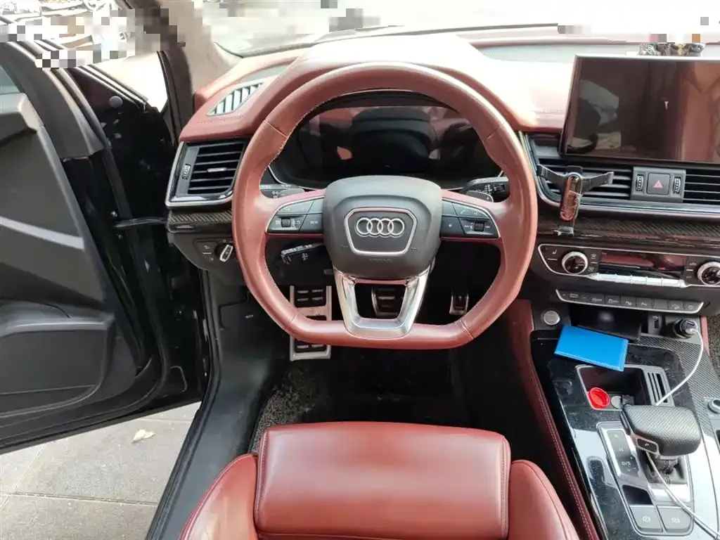 Audi Q5L — фото 9
