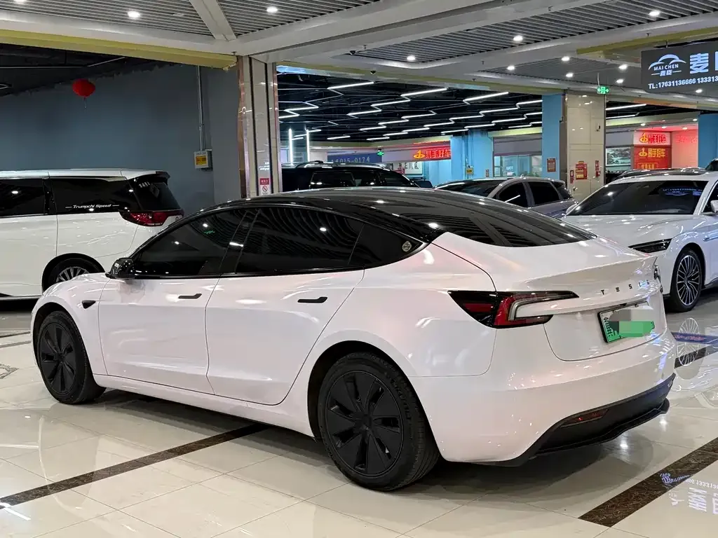 Tesla Model 3 — фото 7