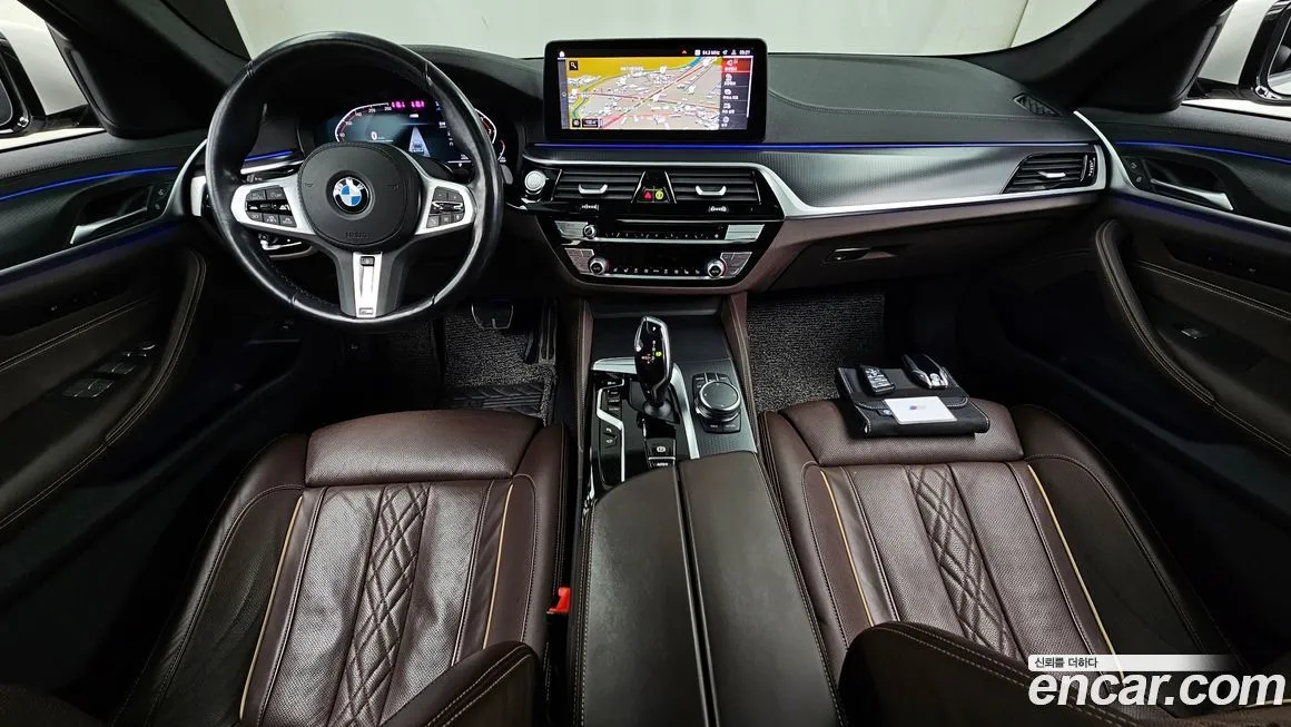 BMW 5-Series — фото 10
