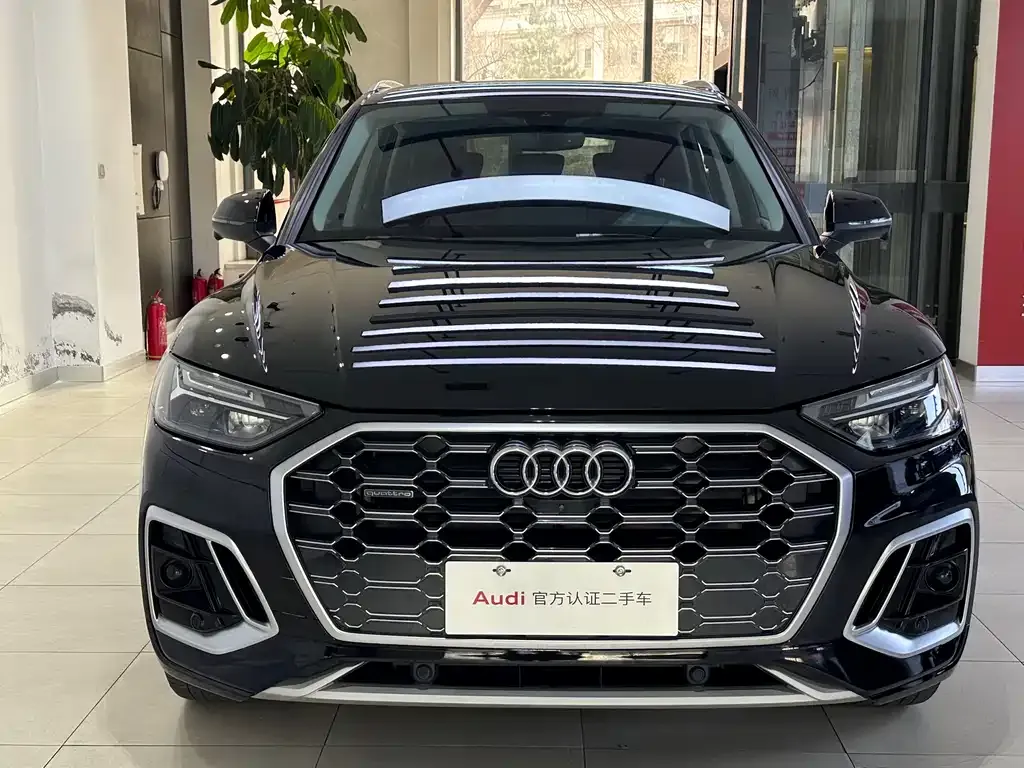 Audi Q5L — фото 6