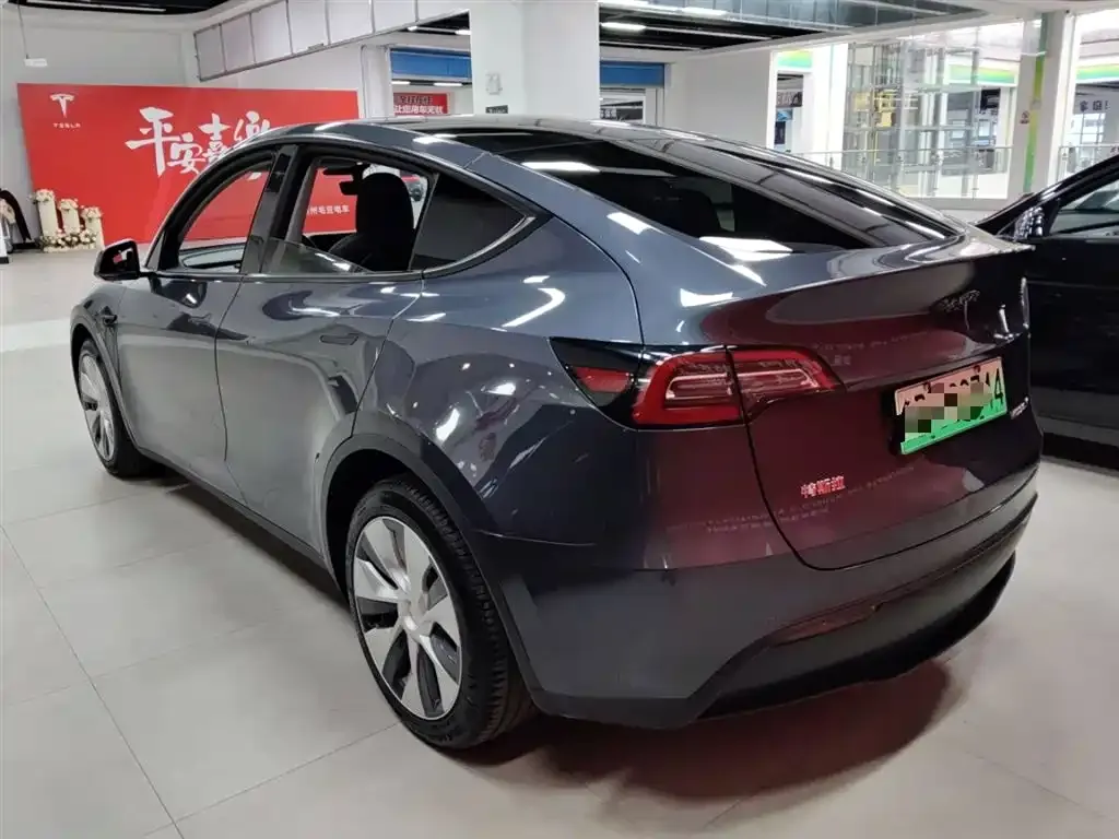 Tesla Model Y — фото 7