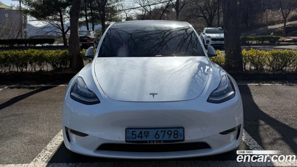 Tesla Model Y — фото 7
