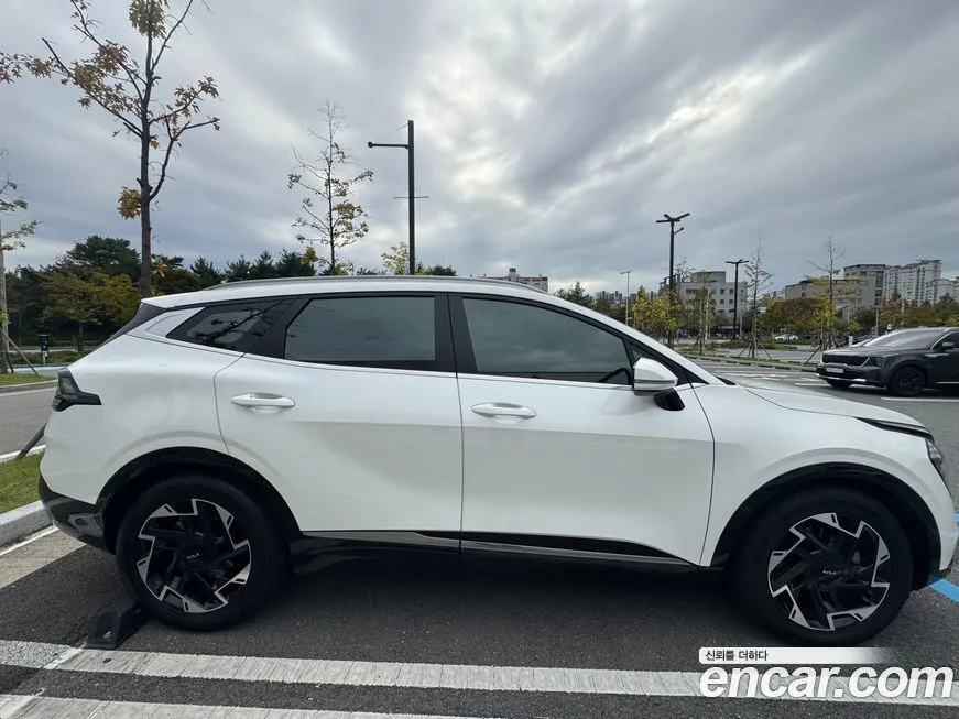 Kia Sportage — фото 7