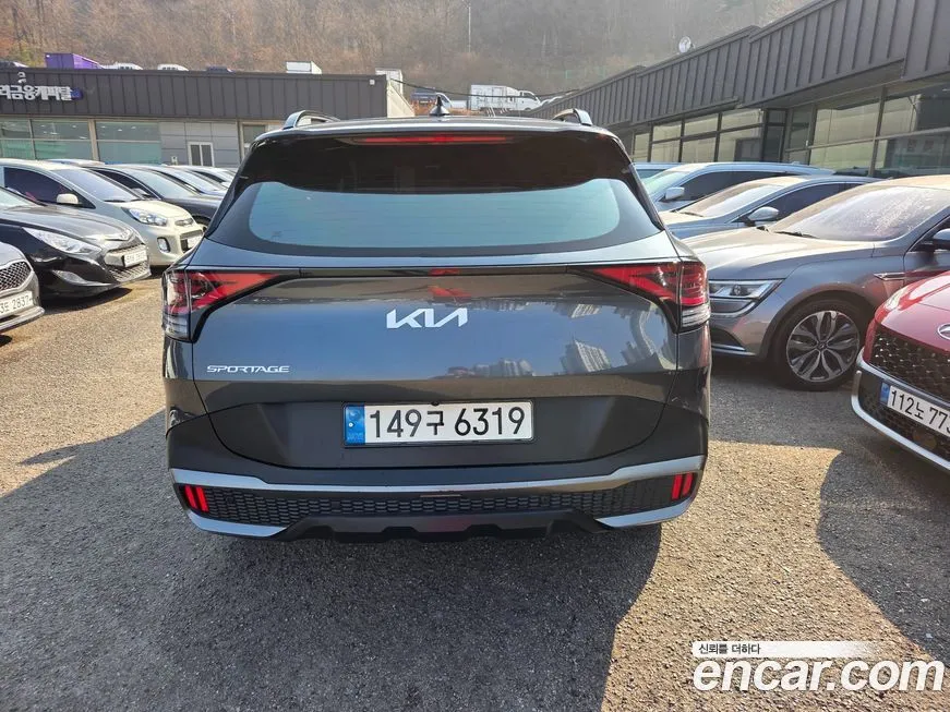 Kia Sportage — фото 8