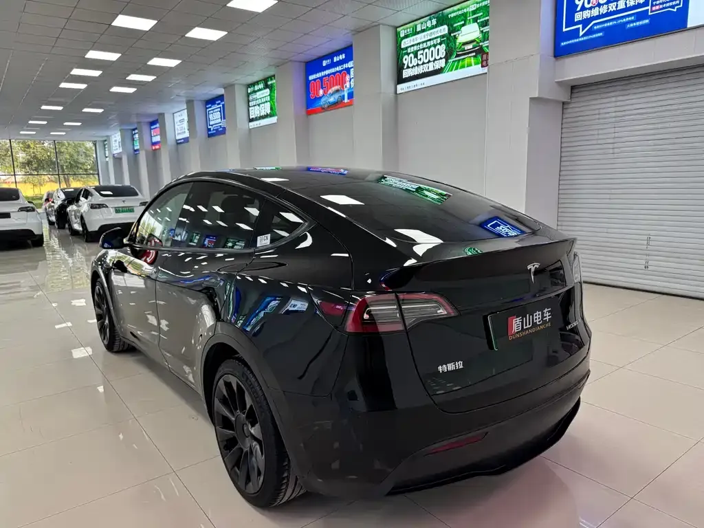 Tesla Model Y — фото 7